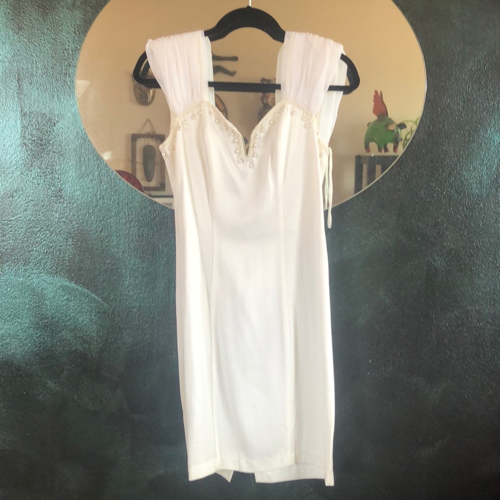 Stunning white with pearls dress